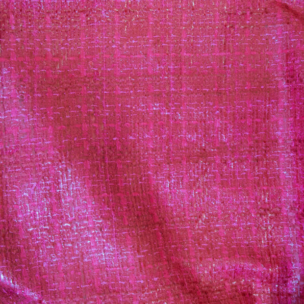 Close-up of pink fabric with a textured pattern